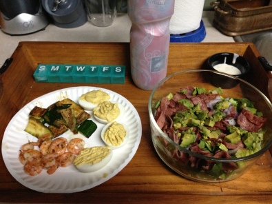 grilled shrimp, grilled zucchini, deviled eggs made with yogurt, lettuce, spinach, red onion, avocado, turkey bacon, organic cilantro lime ranch dressing